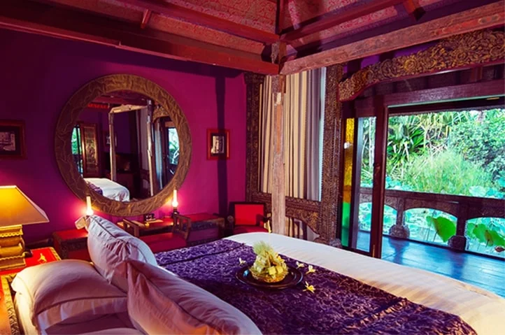Art-filled guest room at Hotel Tugu Bali