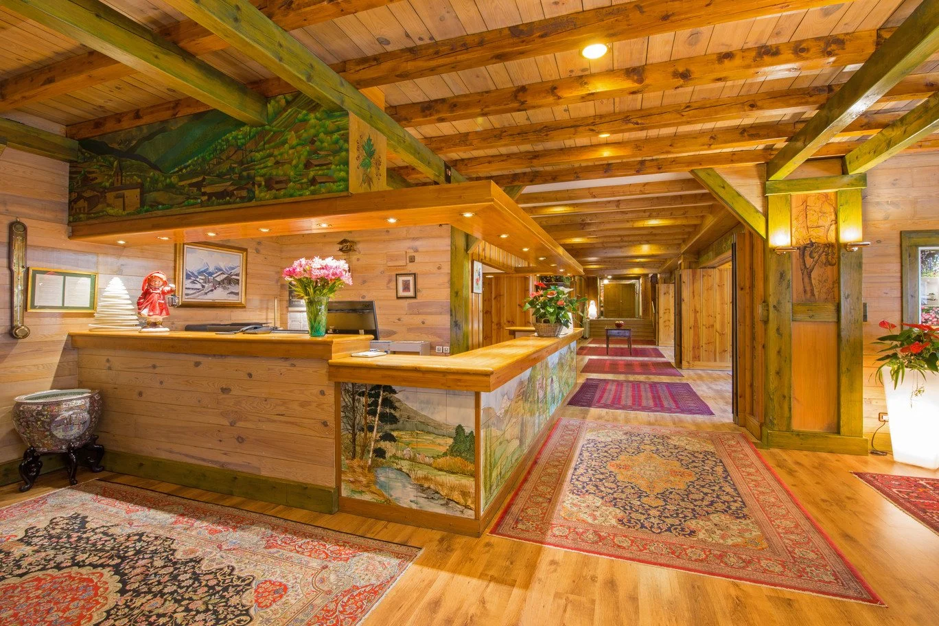 Wood-panelled reception at Hotel Rutllan