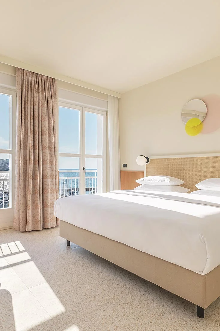 Guest room with waterfront view at Grand Koper