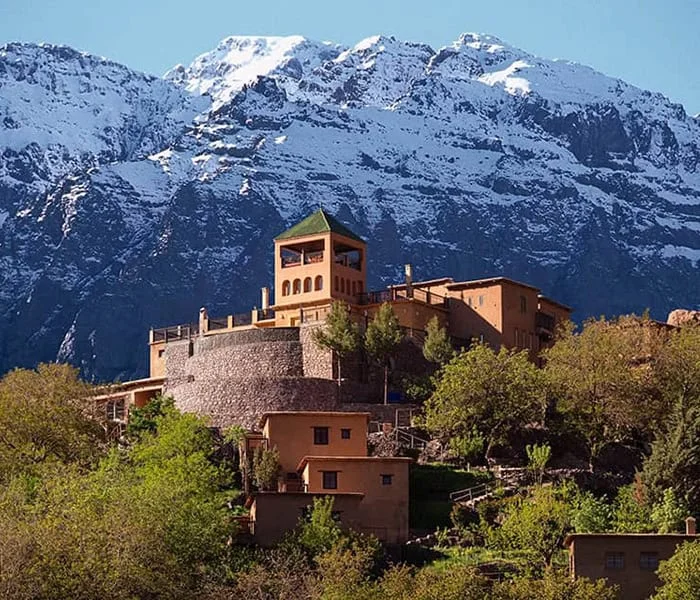 Hilltop kasbah beneath the mountains at Kasbah du Toubkal