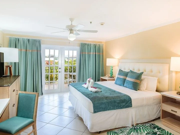 Guest room at Bay Gardens Beach Resort & Spa