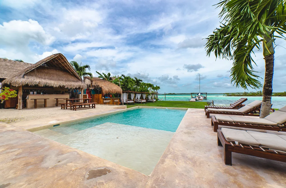 Pool beside the lagoon at Casa Bakal
