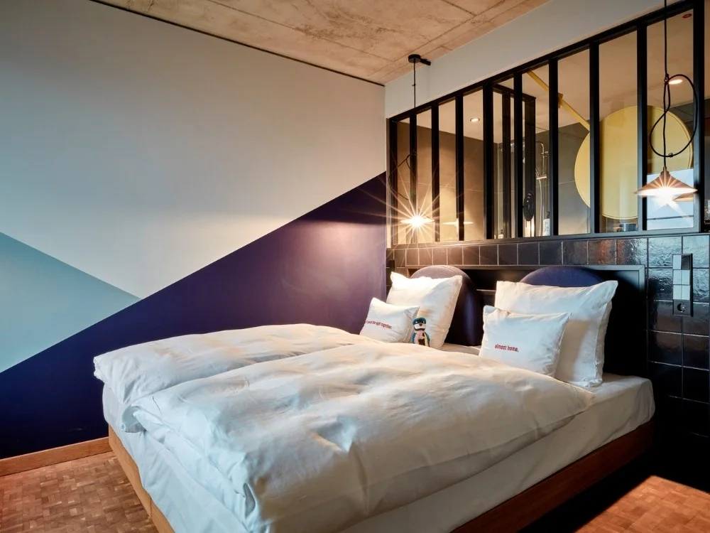 Guest room at 25hours Hotel Das Tour
