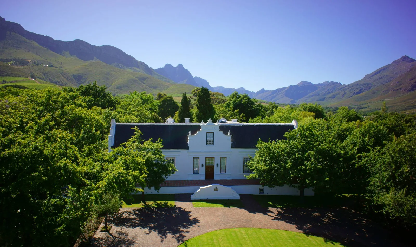 Lanzerac estate buildings and surrounding mountains