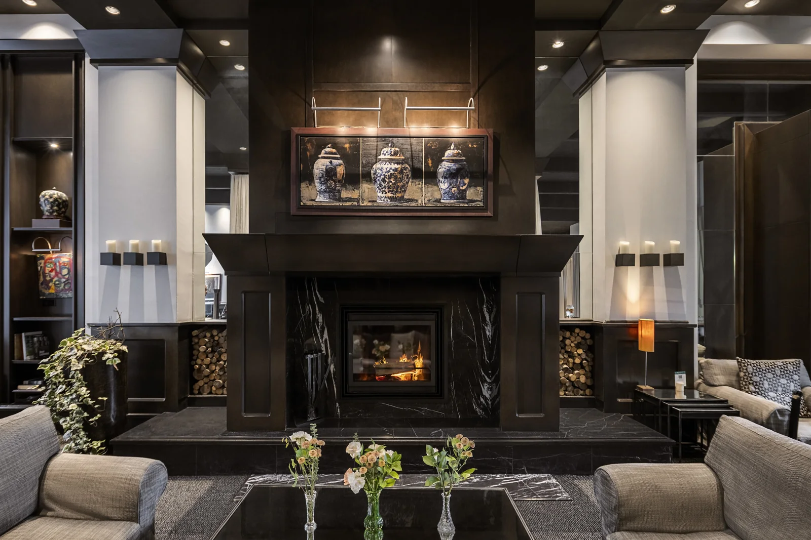 Lounge with fireplace at Le Germain Hotel Québec