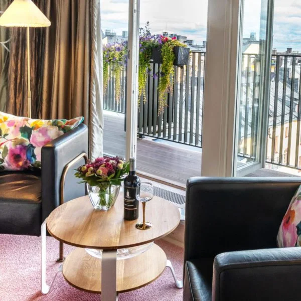 Guest-room seating and balcony at Hotel Rival in Stockholm