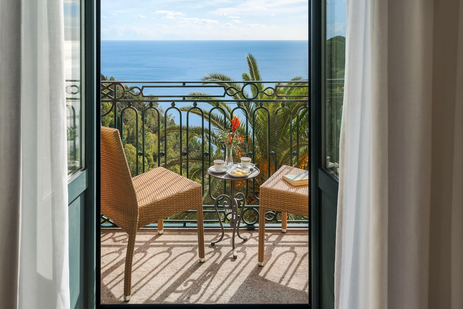 Balcony and sea view at Hotel Villa Schuler in Taormina