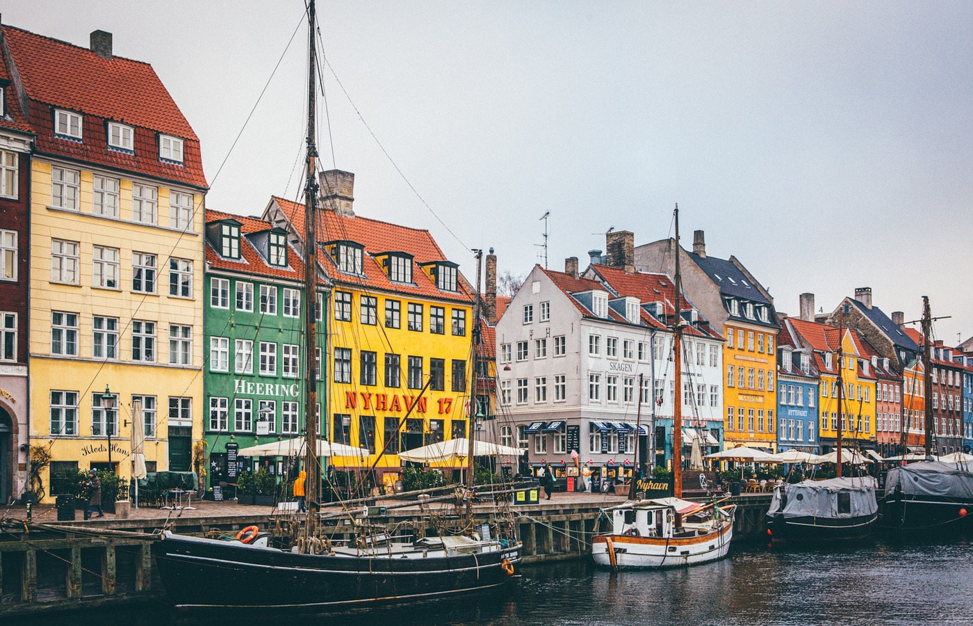 Colourful waterfront buildings and boats at Nyhavn in Copenhagen