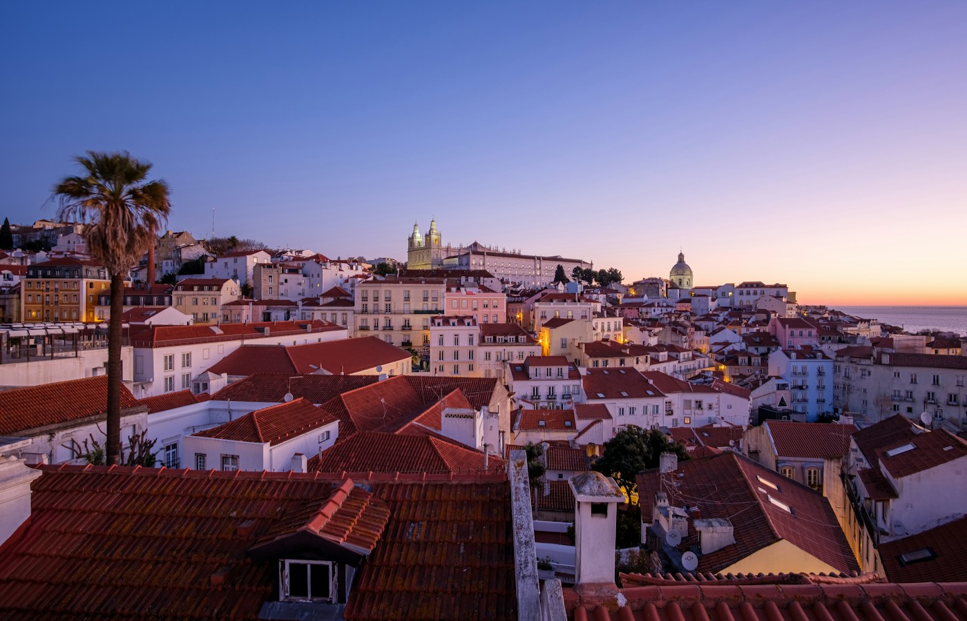 Alfama rooftops in Lisbon at sunrise