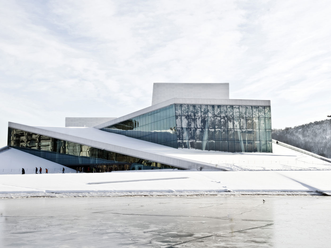 Oslo Opera House and its sloping roof photographed in winter