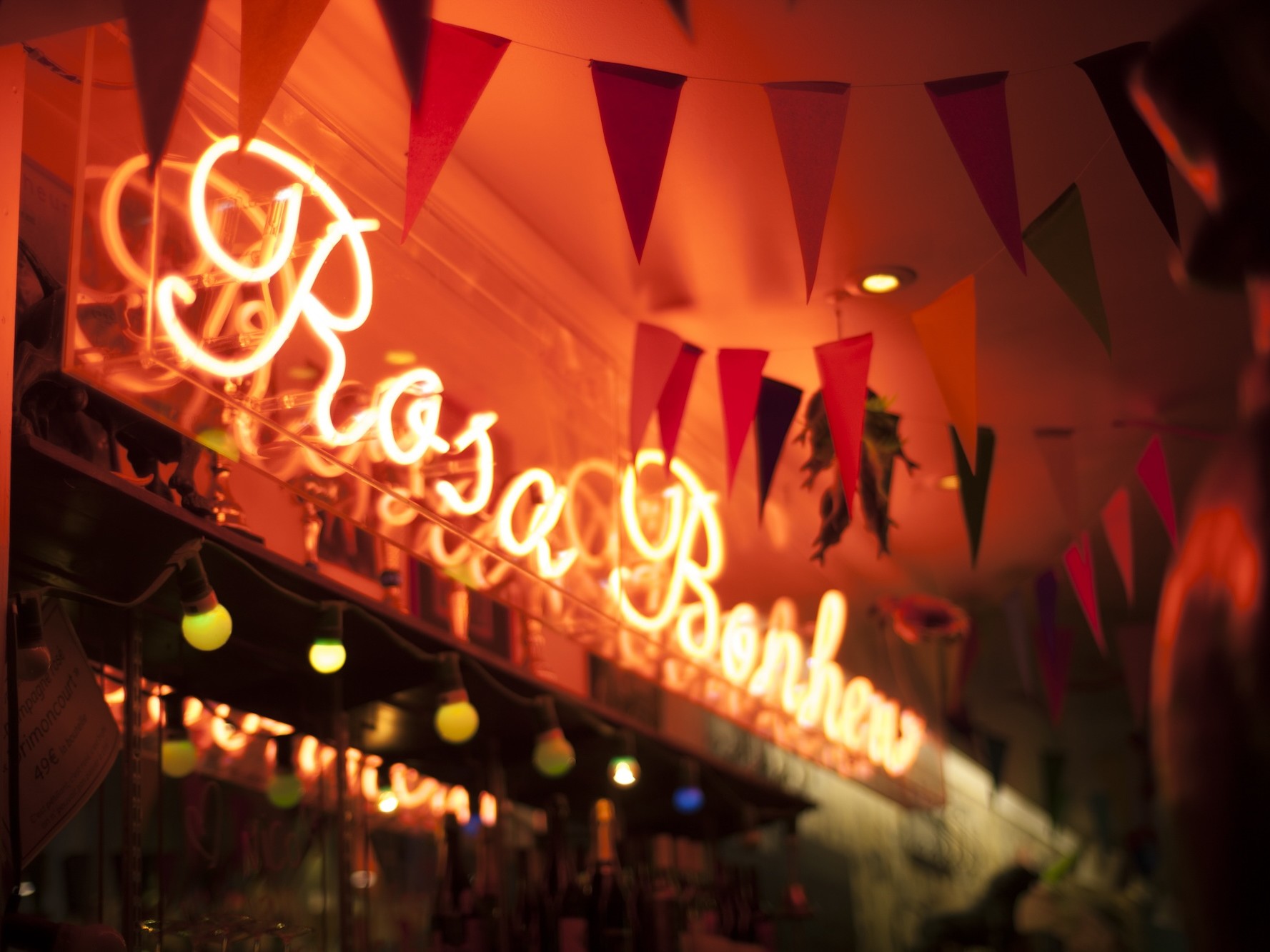 Rosa Bonheur illuminated sign and bunting inside the Buttes-Chaumont guinguette